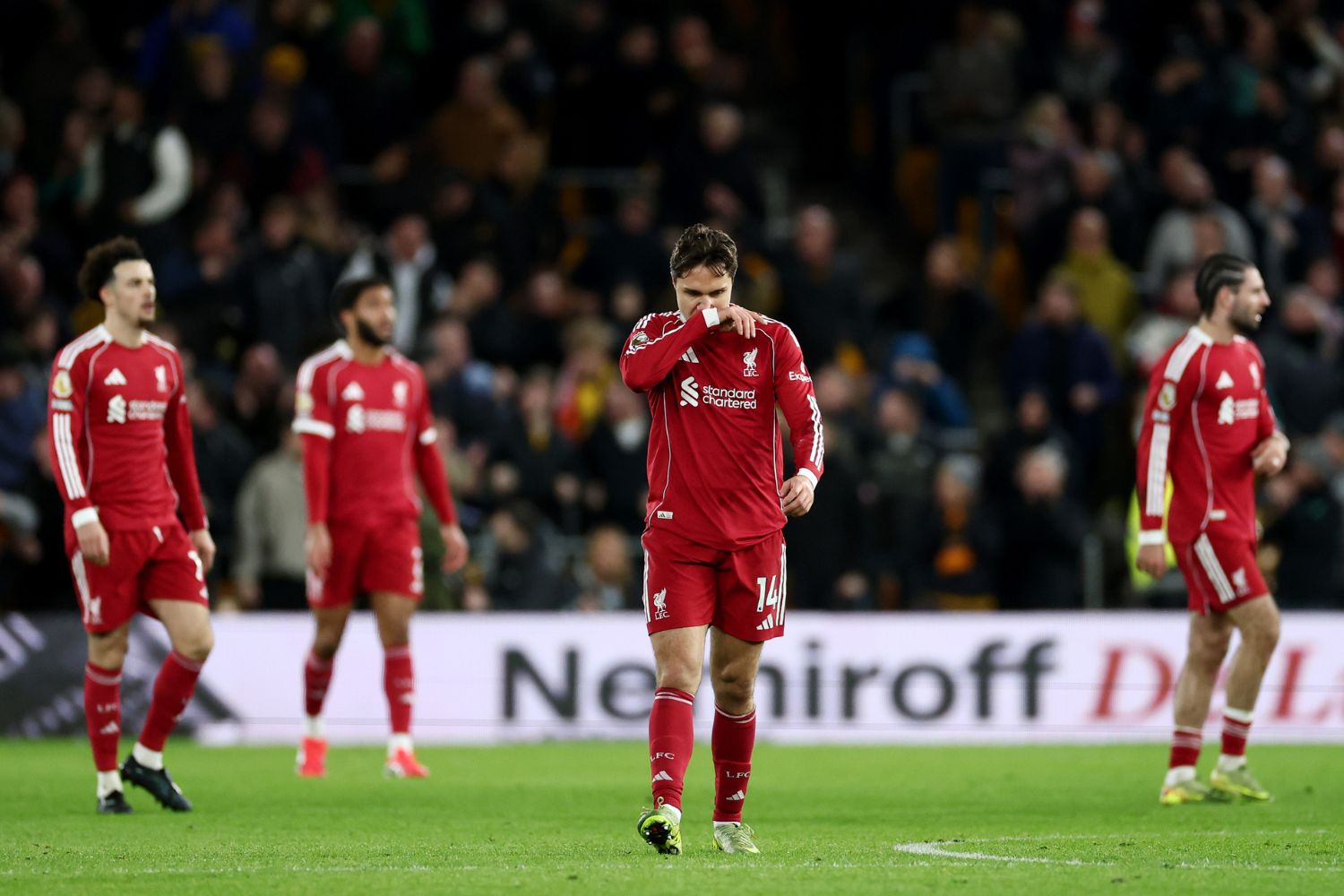 Federico Chiesa of Liverpool looks dejected after Andre of Wolverhampton Wanderers (not pictured) scores his team's second goal during the Premier League match between Wolverhampton Wanderers and Liverpool