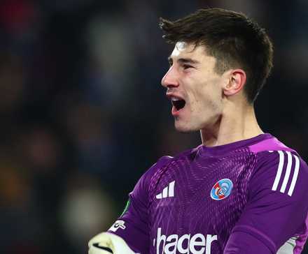Strasbourg's Mike Penders celebrates after Samir El Mourabet scores their second goal 