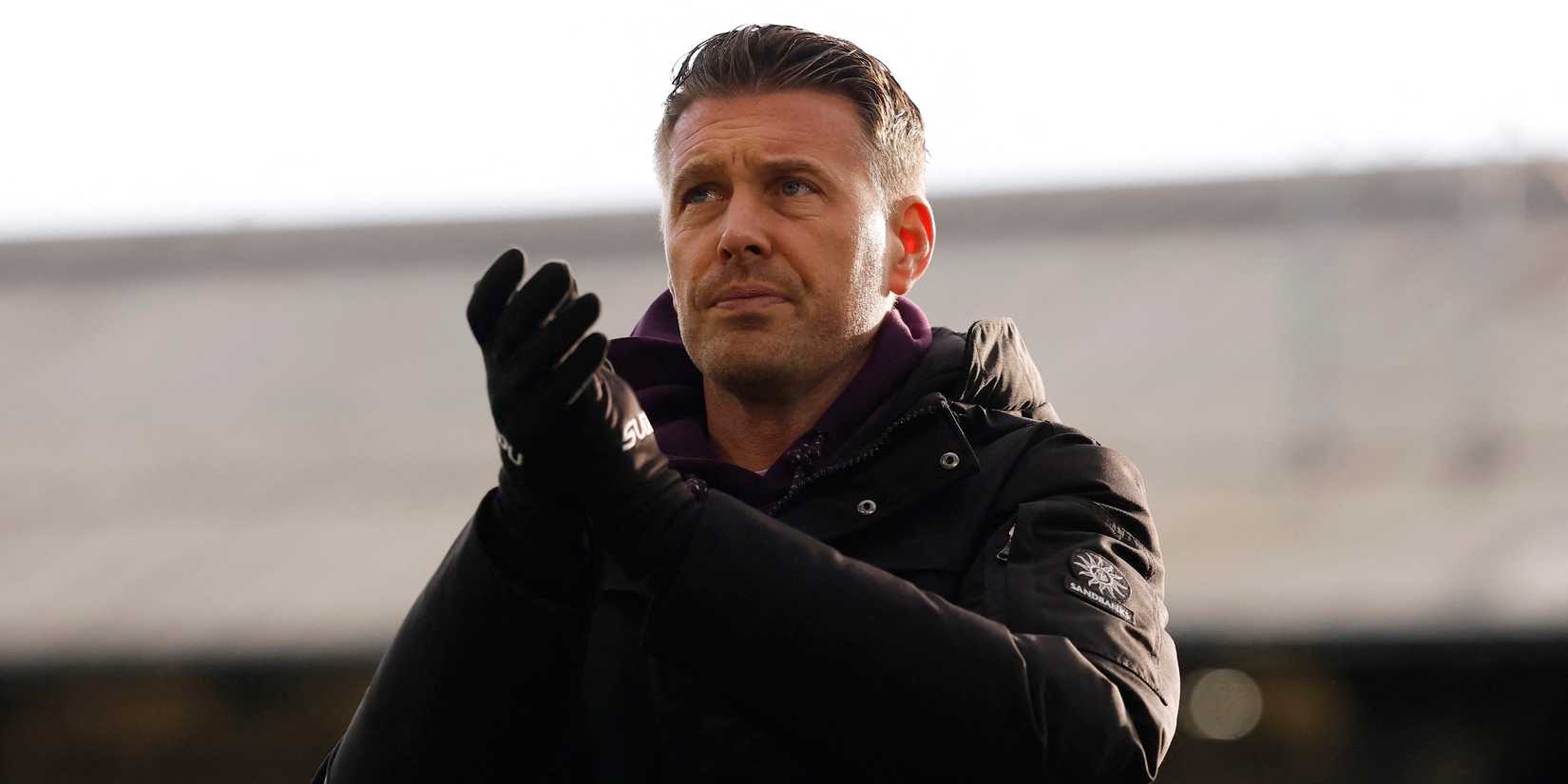Wolverhampton Wanderers manager Rob Edwards applauds fans after the match 