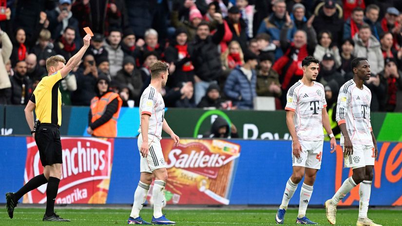 Nine-men Bayern avoid defeat in Leverkusen