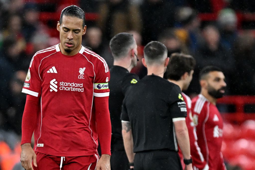 Virgil van Dijk of Liverpool looks dejected following the Premier League match between Liverpool and Tottenham Hotspur at Anfield on March 15, 2026 in Liverpool, England