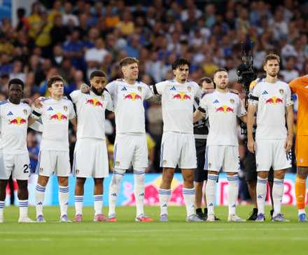 Leeds United players during a minutes silence in tribute to Diogo Jota and his brother Andre Silva before the match