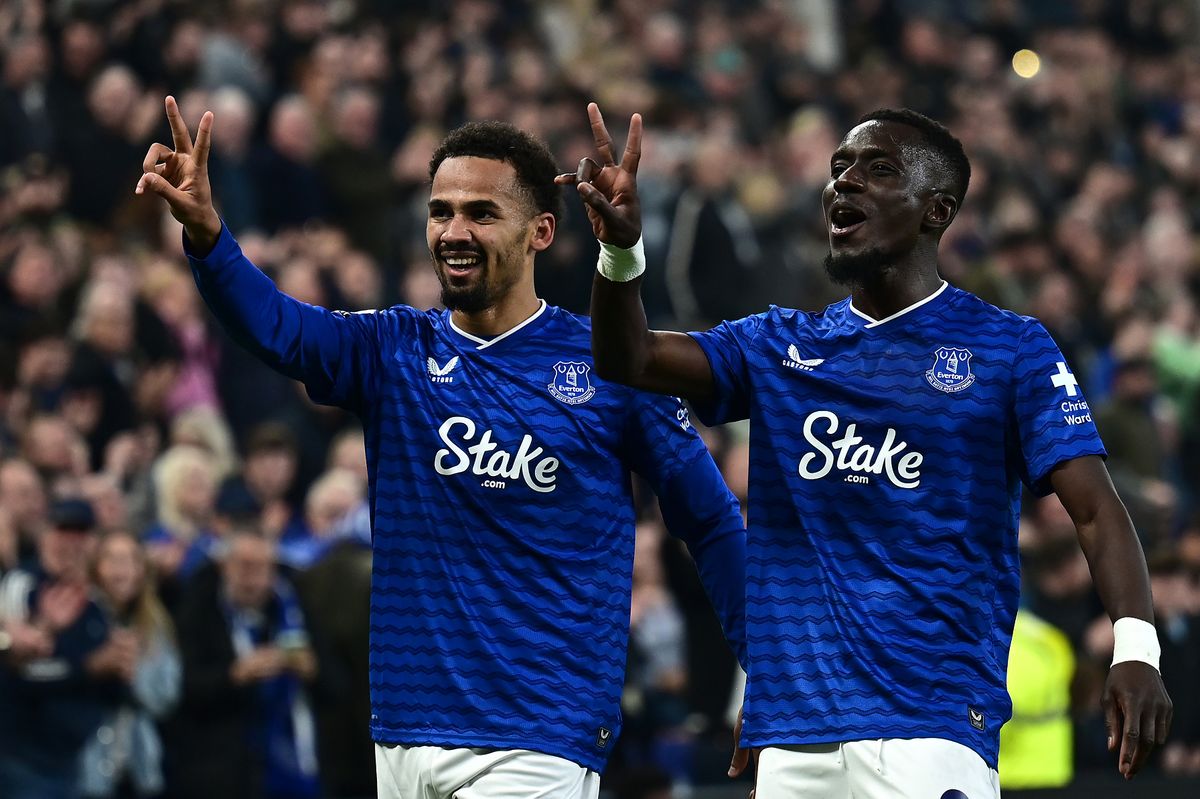 Iliman Ndiaye of Everton celebrates scoring a goal, to make the score 3-0 against Chelsea, with his team-mate Idrissa Gueye
