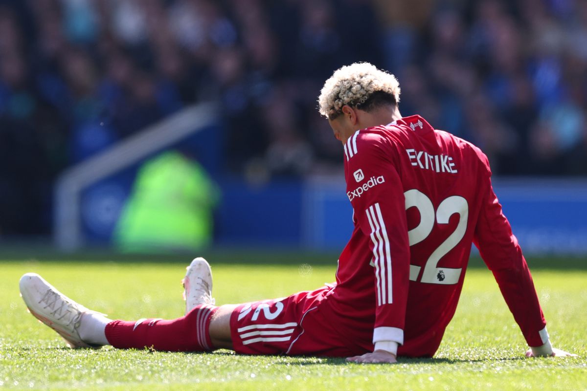 Hugo Ekitike of Liverpool goes down injured