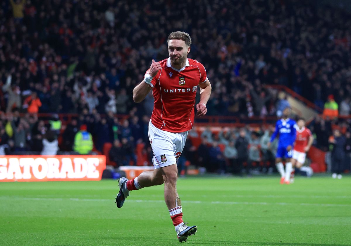 Sam Smith of Wrexham celebrates scoring his team's first goal during the Emirates FA Cup Fifth Round match between Wrexham and Chelsea