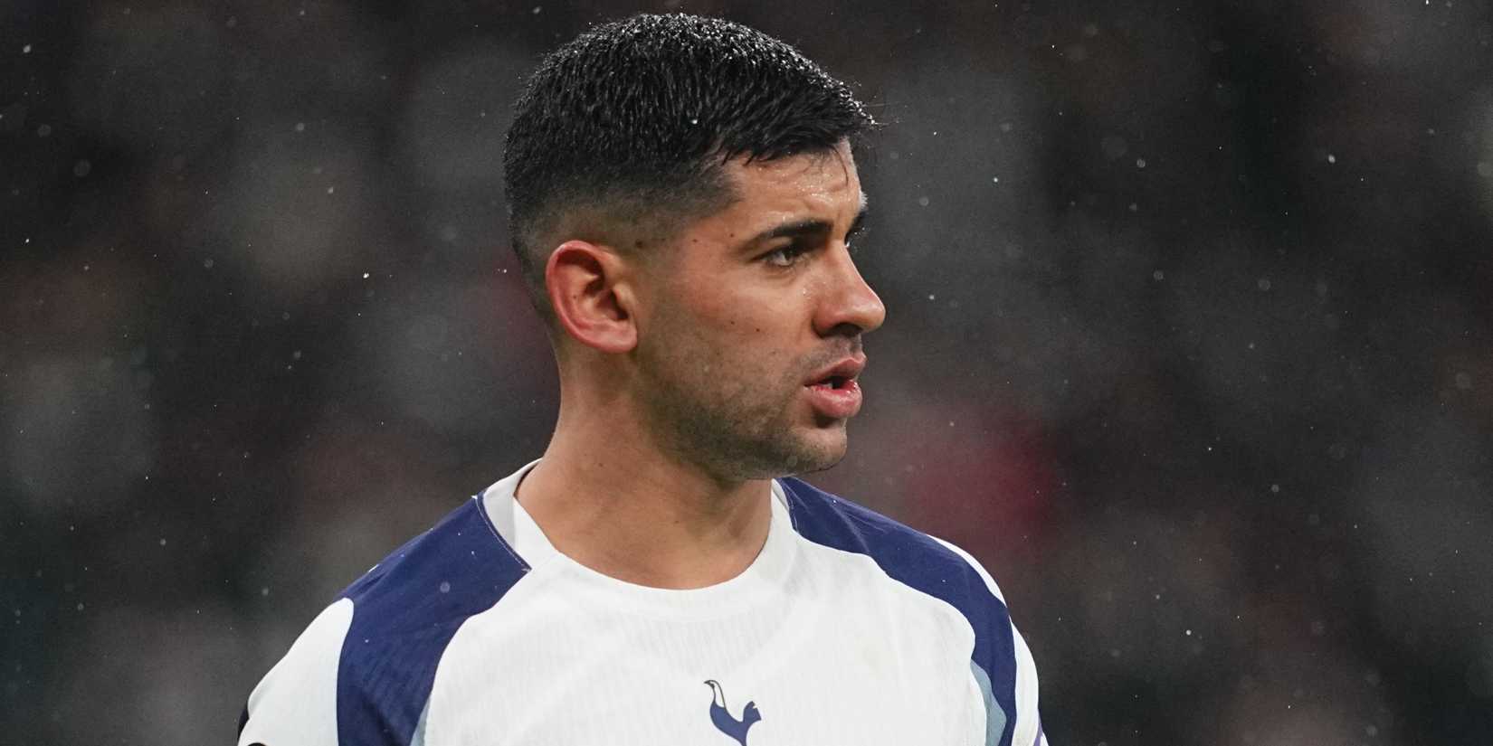 Cristian Romero of Tottenham Hotspur looks on