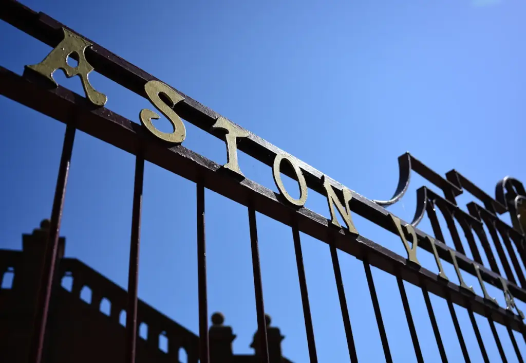 Aston Villa seen written on a gate at Villa Park
