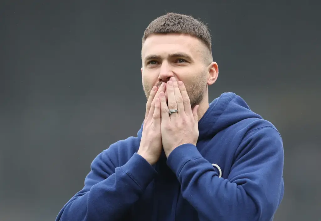 Stuart Dallas blows a kiss to the Leeds United supporters