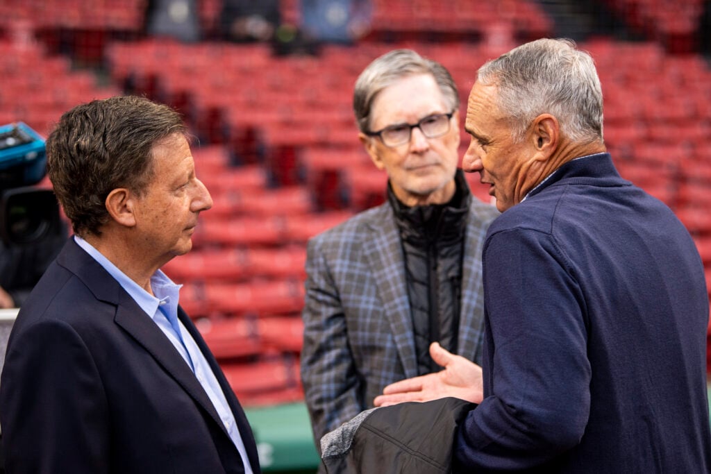 FSG bosses John Henry and Tom Werner converse