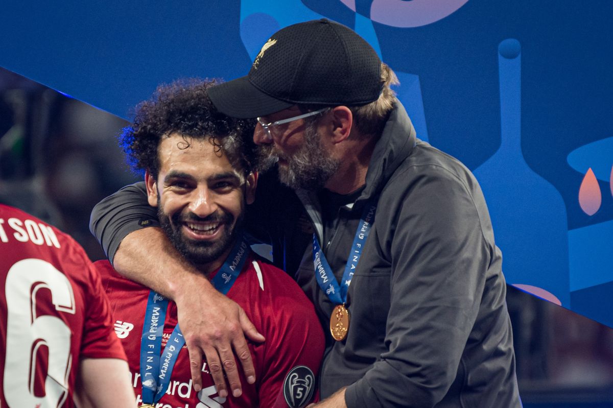 Jurgen Klopp celebrates with Mohamed Salah after the UEFA Champions League Final between Tottenham Hotspur and Liverpool at Estadio Wanda Metropolitano on June 1, 2019 in Madrid