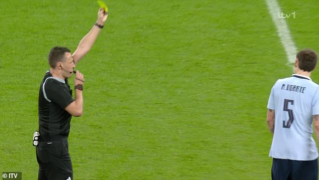 Farcical refereeing decision sees Man United star escape red card despite being brandished TWO yellow cards in England's draw with Uruguay at Wembley - in new 'Graham Poll' moment