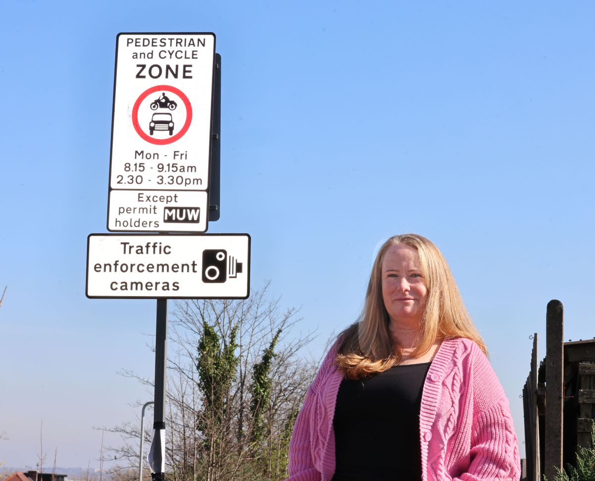 Toni Langley and the parking fines issued to local residents in Woolton near the local school enforcement cameras. Photo by Colin Lane
