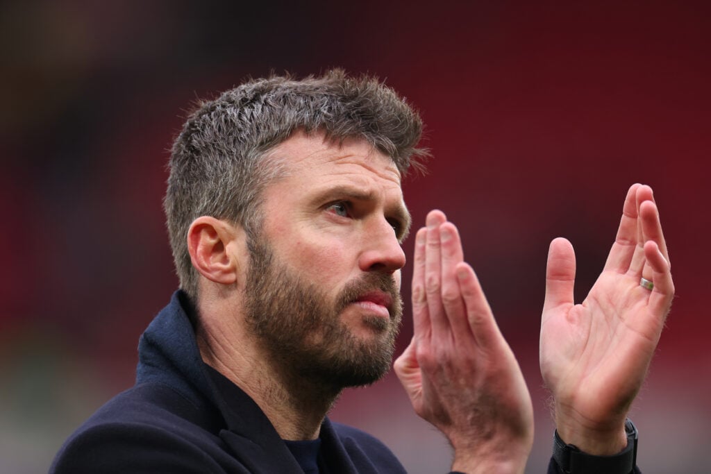 Michael Carrick clapping towards Manchester United fans