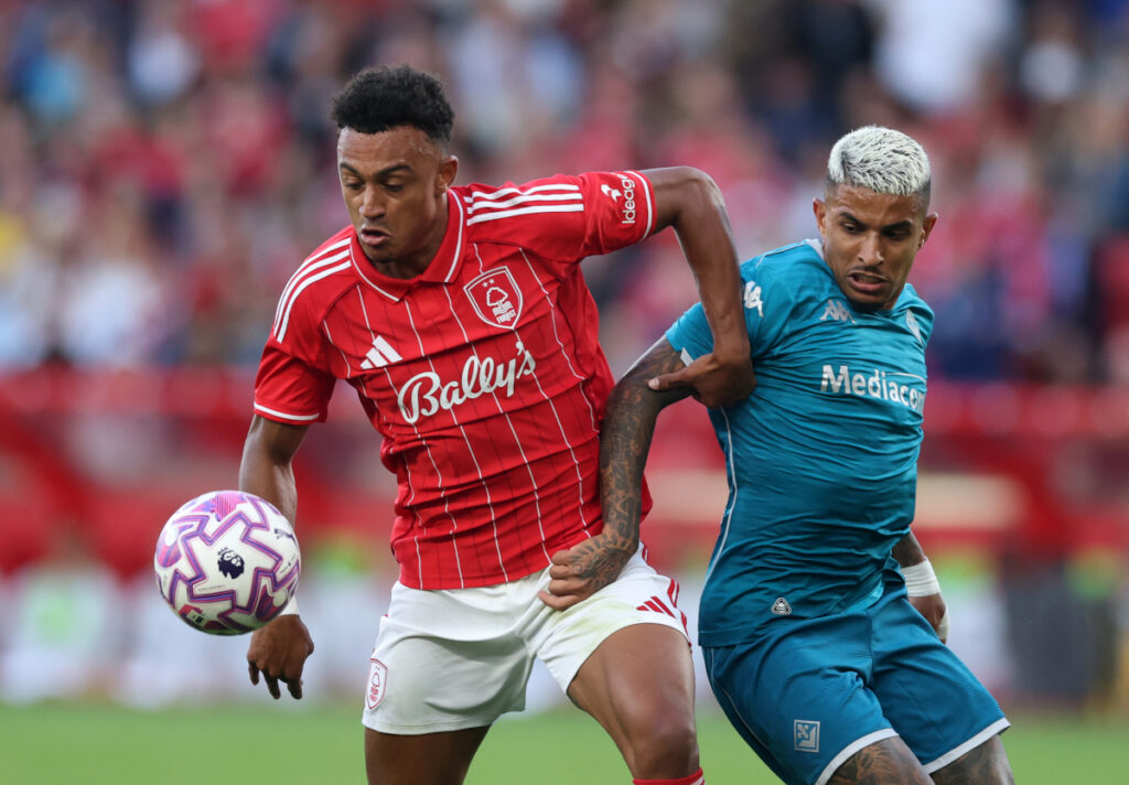 NOTTINGHAM, ENGLAND - AUGUST 05: Dan Ndoye of Nottingham Forest battles for possession with Domilson Dodo of Fiorentina during the pre-season friendly match between Nottingham Forest and ACF Fiorentina at City Ground on August 05, 2025 in Nottingham, England. (Photo by Carl Recine/Getty Images)