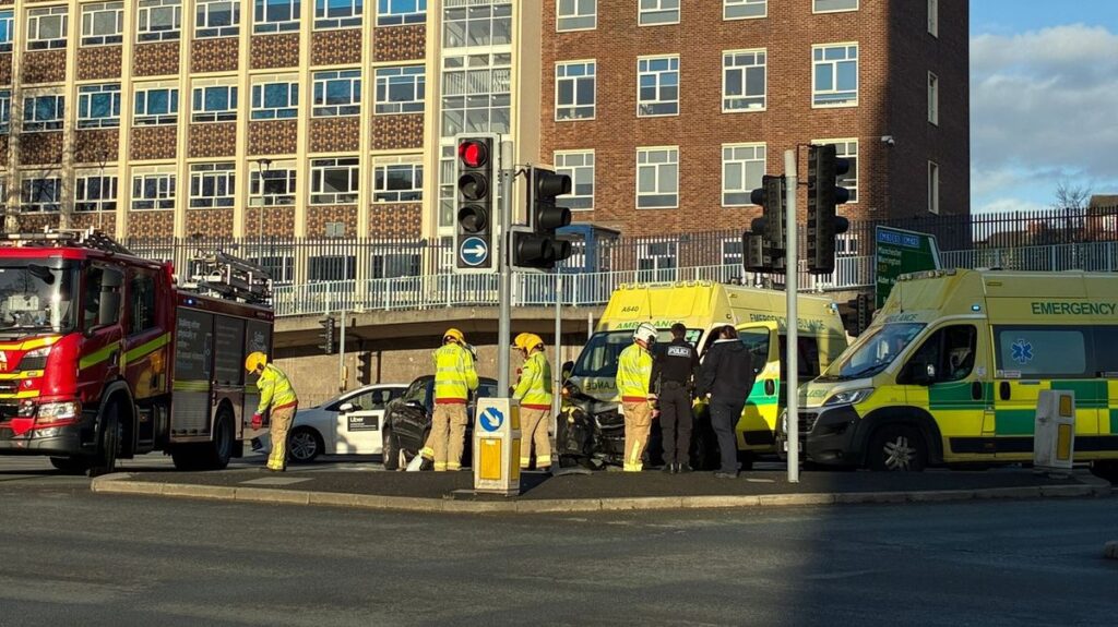 Two people taken to hospital after ambulance and car crash in Liverpool