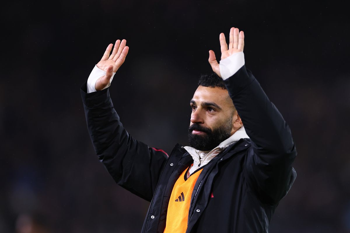 Mohamed Salah of Liverpool waves to the fans at full time during the Premier League match between Leeds United and Liverpool at Elland Road on December 6, 2025 in Leeds, England