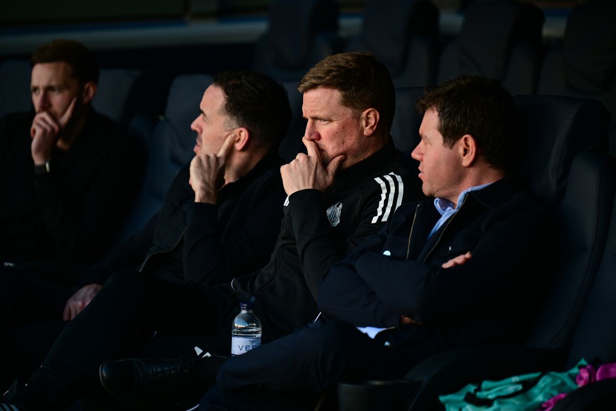 Newcastle United head coach Eddie Howe watches training with performance director James Bunce (left) and sporting director Ross Wilson