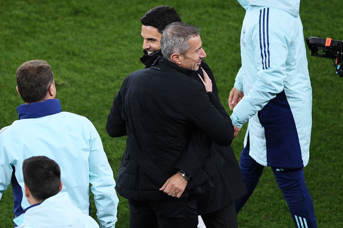Mikel Arteta, Manager of Arsenal and Andrea Berta, Sporting Director of Arsenal, celebrate after the UEFA Champions League 2024/25 Quarter Final First Leg match between Arsenal FC and Real Madrid C.F. at Arsenal Stadium on April 08, 2025