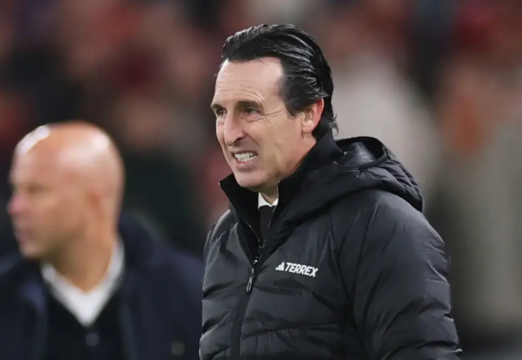 Unai Emery sports a concerned expression as he looks at Aston Villa in action from the touchline