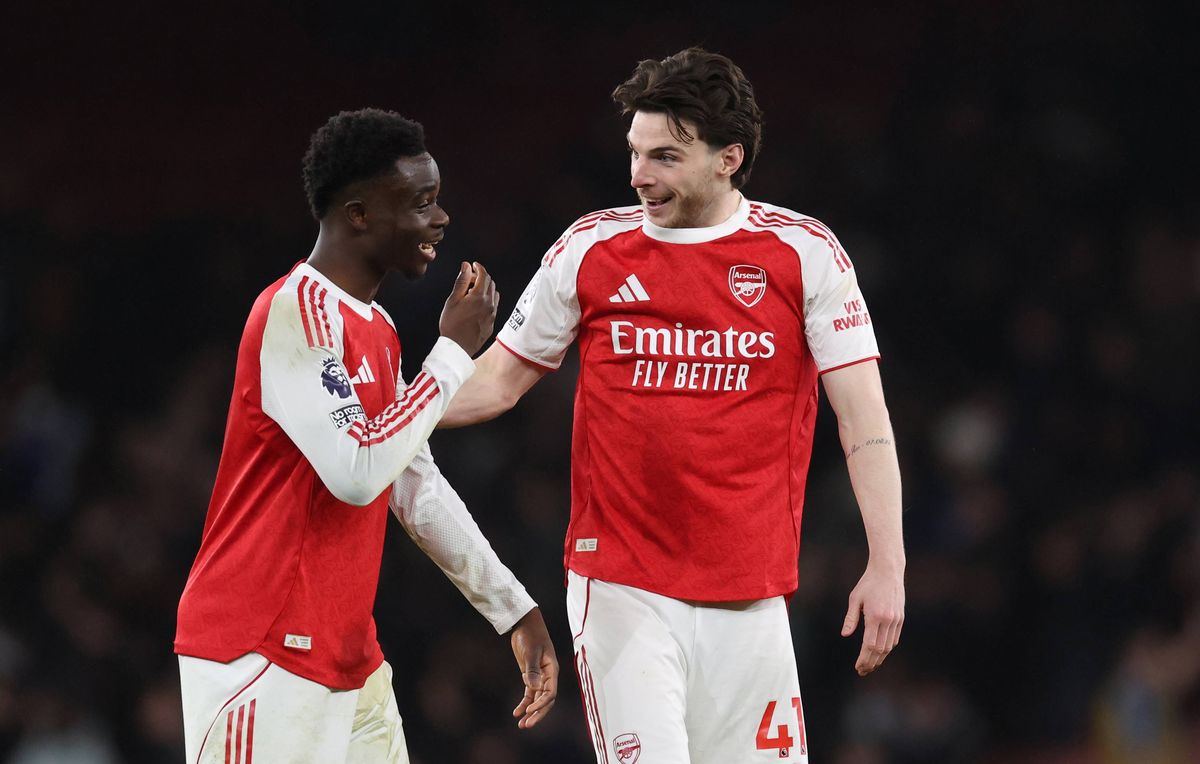 Bukayo Saka and Declan Rice of Arsenal interact during the Premier League match between Arsenal and Chelsea at Emirates Stadium