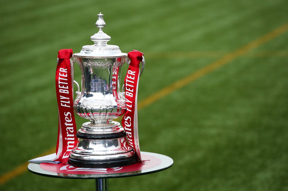 BUXTON, ENGLAND - DECEMBER 04: A detailed view of the FA Cup Trophy on the pitch prior to the Emirates FA Cup Second Round match between Buxton F.C. and Morecambe F.C. at the Tarmac Silverlands Stadium on December 04, 2021 in Buxton, England. (Photo by Alex Livesey/Getty Images)