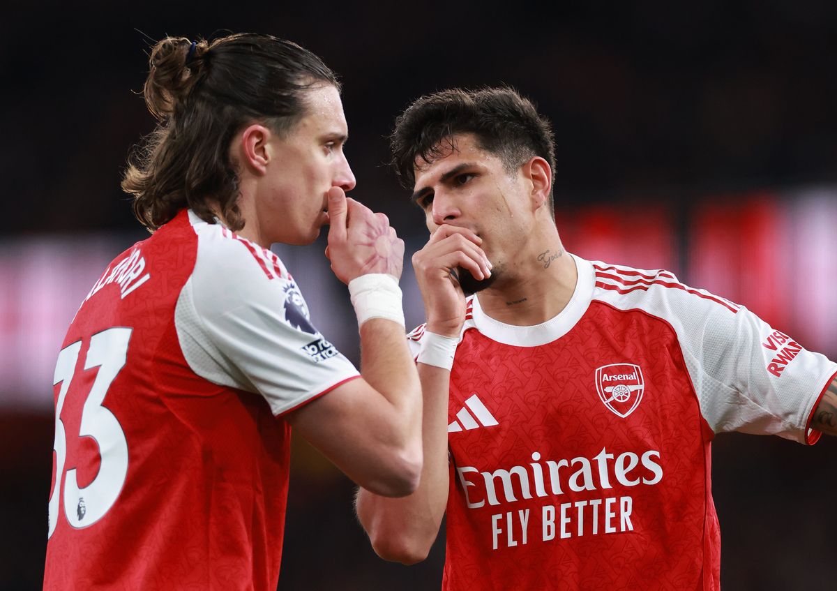 Riccardo Calafiori and Piero Hincapie of Arsenal during the Premier League match between Arsenal and Brentford at Emirates Stadium on December 3, 2025 in London, England. 
