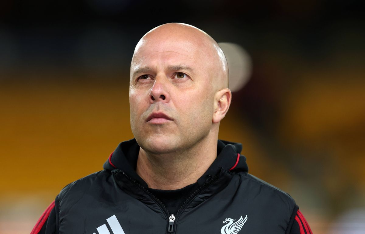 Reds boss Arne Slot looks on