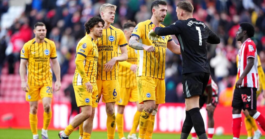 Goalkeeper Bart Verbruggen salutes his Brighton team-mates