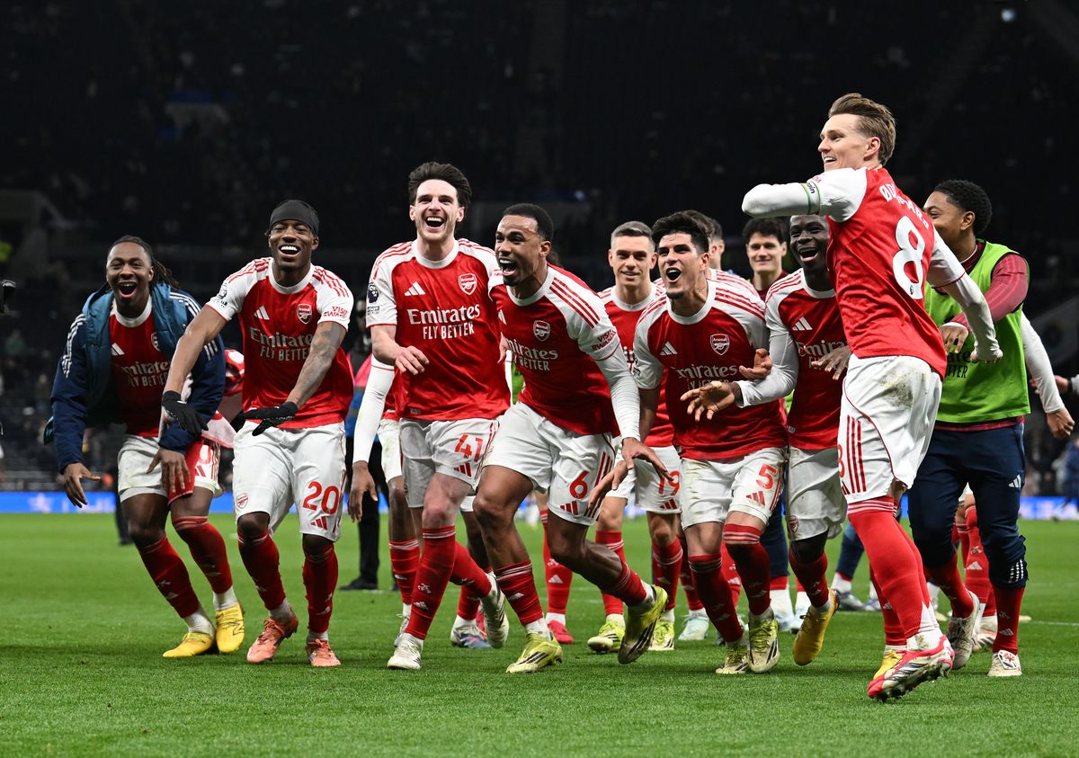 Eberechi Eze, Noni Madueke, Declan Rice, Gabriel Magalhaes, Piero Hincapie, Bukayo Saka and Martin Odegaard of Arsenal celebrates after the Premier League match between Tottenham Hotspur and Arsenal at Tottenham Hotspur Stadium on February 22, 2026 in London, England. 