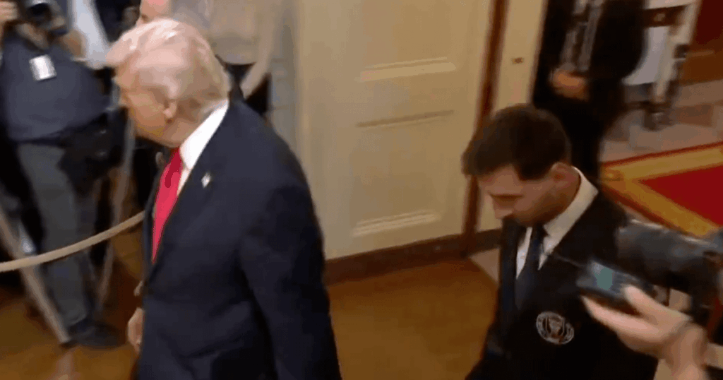 Lionel Messi 'hangs head in shame' as soccer star walks behind Donald Trump