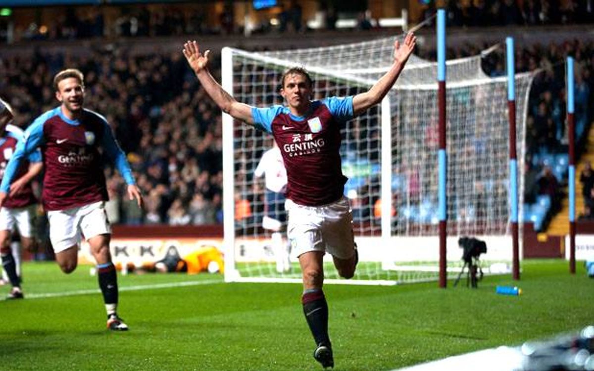 Stephen Warnock of Aston Villa celebrates his goal against Bolton
