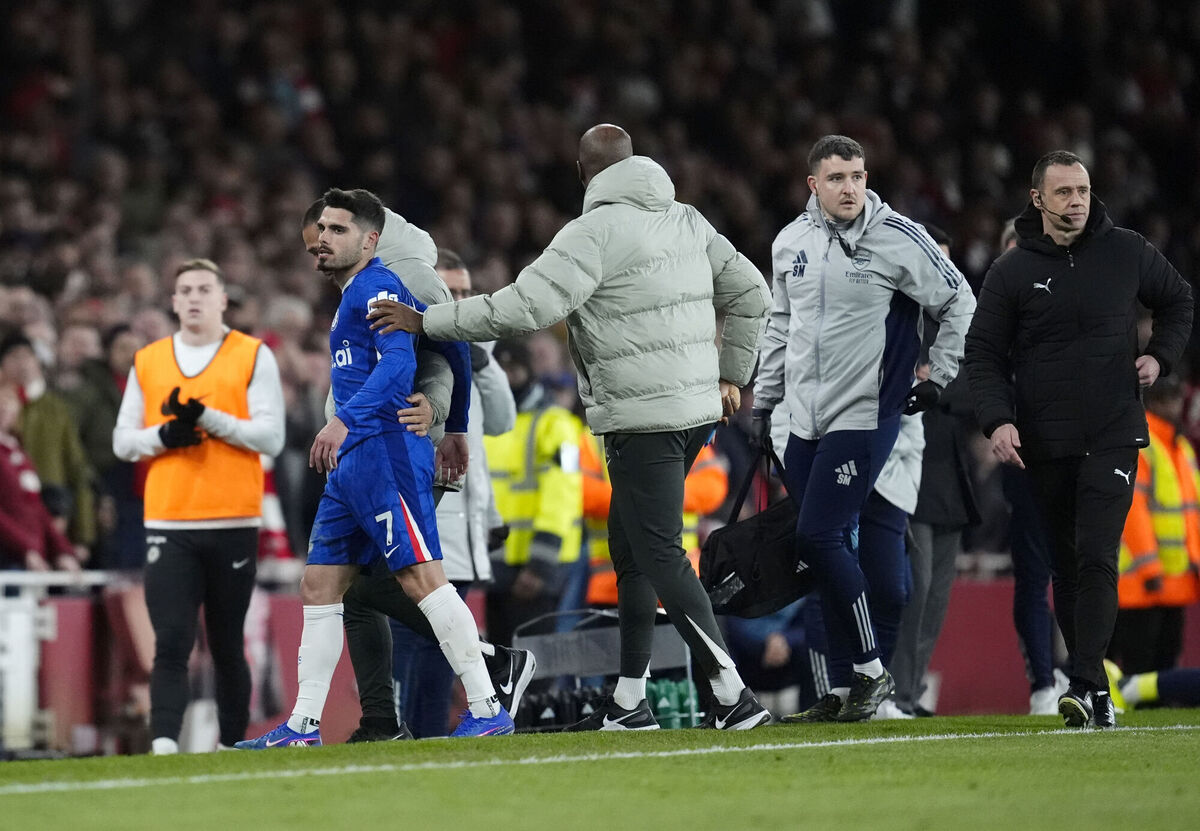 Chelsea's Pedro Neto (left) leabes the field after receiving a red card. Pic: Nick Potts/PA