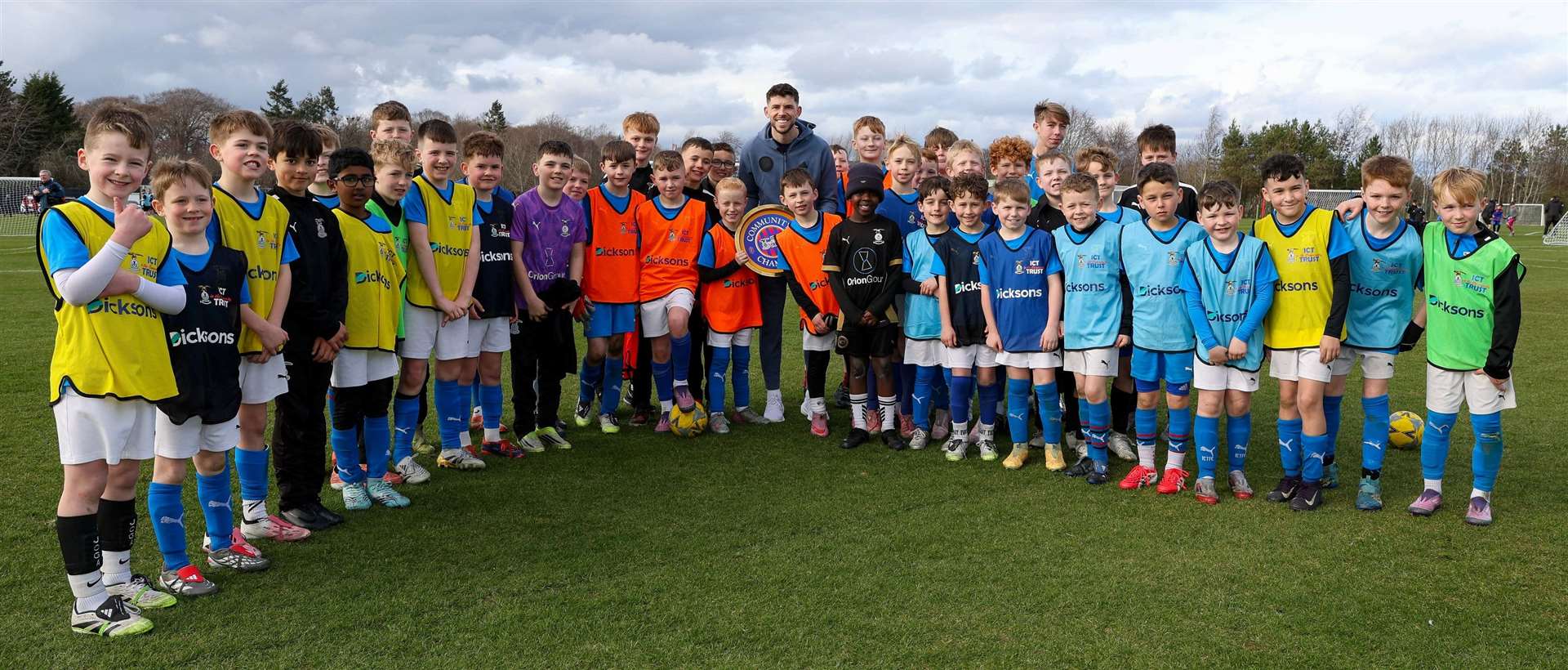 Ryan Christie presented awards for the first children's football festivals to take place at the Caley Thistle Community Hub after its official opening. Picture: Sportpix