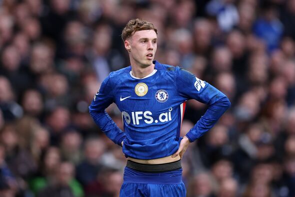 Cole Palmer standing ont he pitch. Cole Palmer standing ont he pitch.