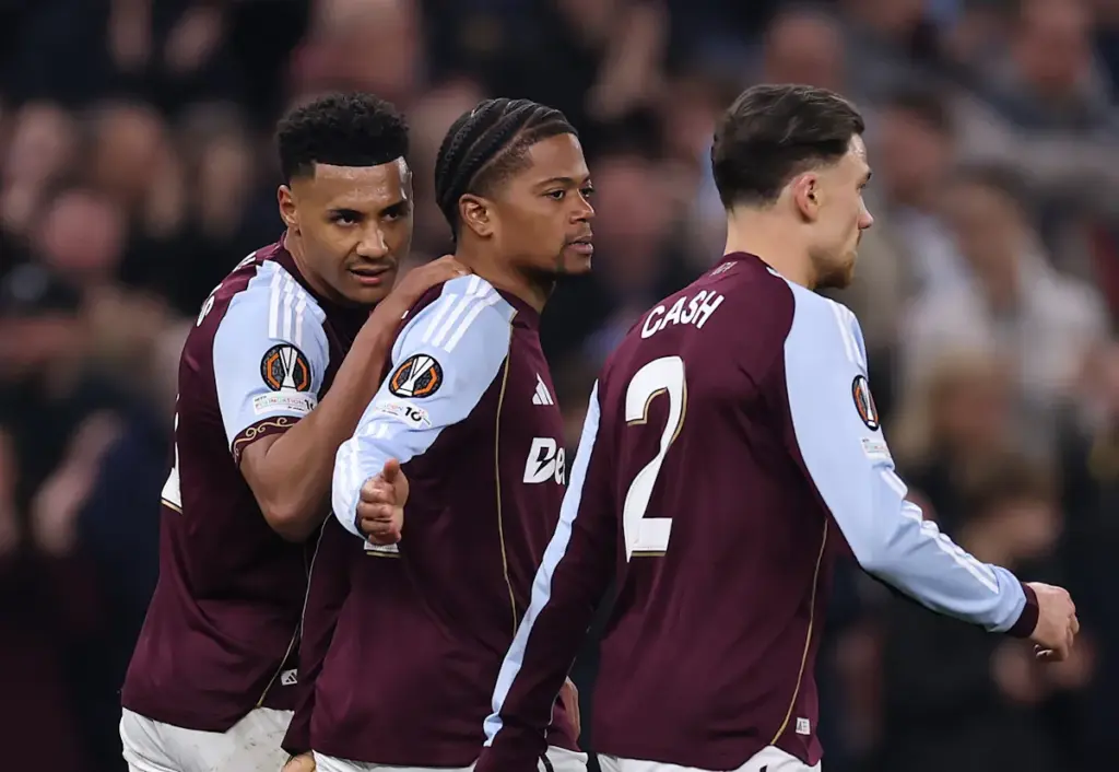 Ollie Watkins celebrates with Leon Bailey after Aston Villa score