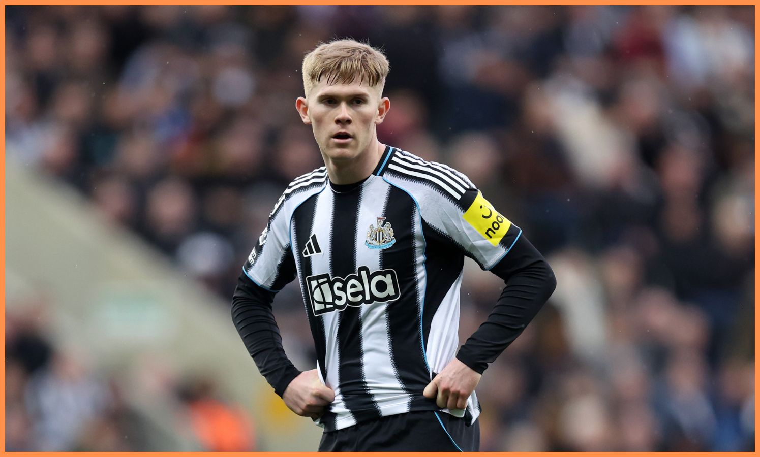 Newcastle United's Lewis Hall looks on