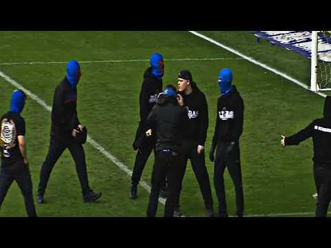 Men In Gemp Suits Disrupt A Football Match