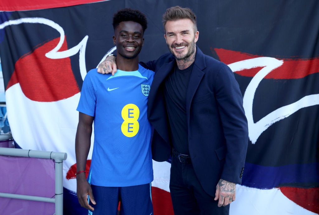 Bukayo Saka and David Beckham pose for a picture during an England World Cup 2022 Training Session