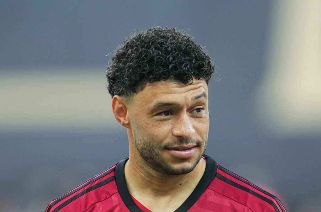 Alex Oxlade-Chamberlain looking on before a Besiktas game