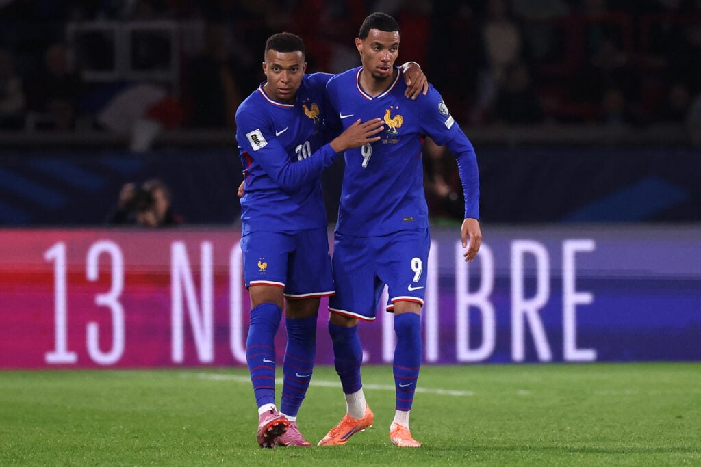 Kylian Mbappe and Hugo Ekitike embrace after France score during the FIFA World Cup qualifying match against Azerbaijan