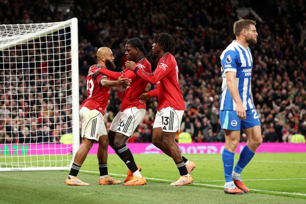 Bryan Mbeumo celebrates scoring his team's fourth with teammates Ayden Heaven and Patrick Dorgu during the Premier League match between Manchester United and Brighton and Hove Albion at Old Trafford in 2025 in Manchester, England.