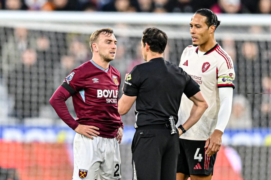 West Ham captain Jarrod Bowen speaks to referee Darren England