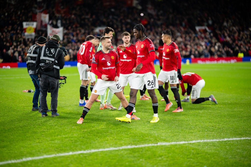 Luke Shaw and Ayden Heaven walk out ahead of the Premier League match between Manchester United and Newcastle United at Old Trafford in 2025 in Manchester, England.