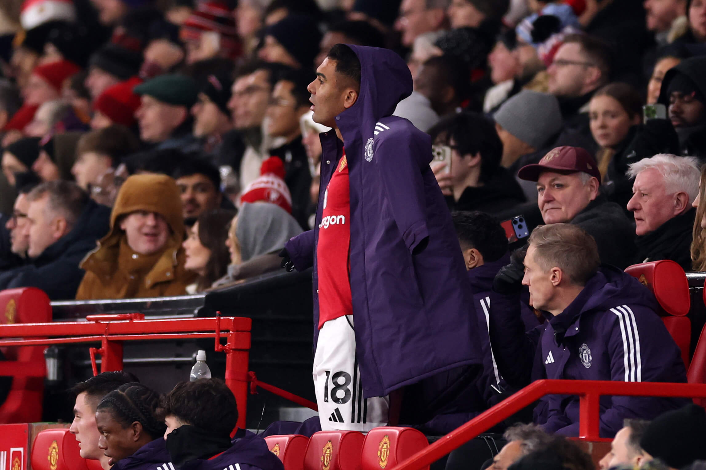 Casemiro looks on from the substitutes' bench during the Premier League match between Manchester United and Newcastle United 