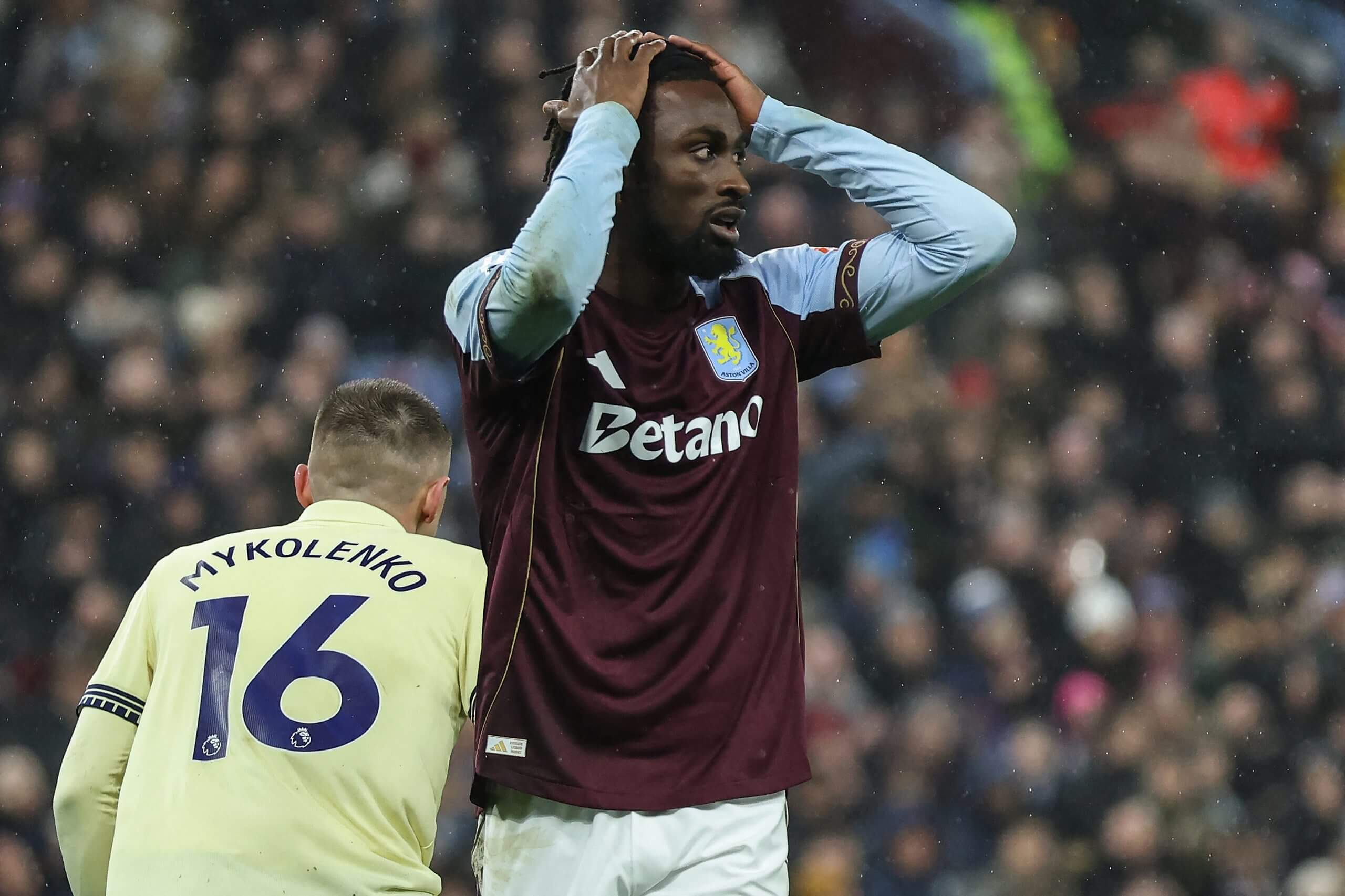 EVann Guessand holds his head in his hands after missing a chance for Aston Villa against Everton