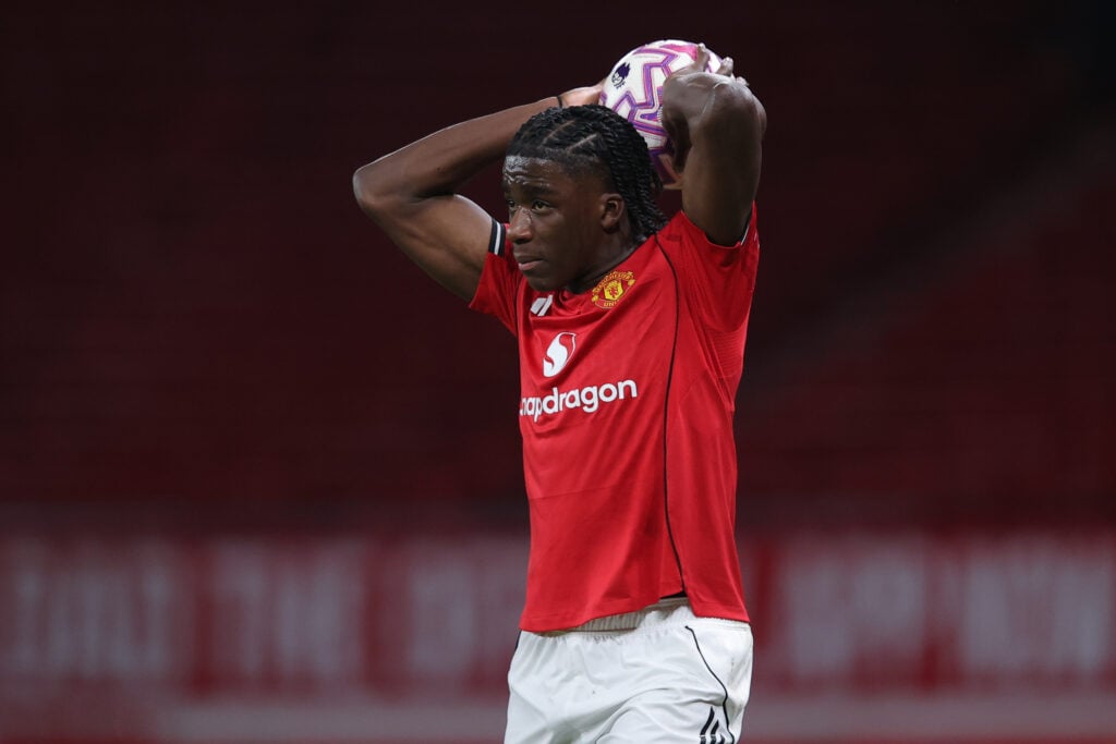 Godwill Kukonki takes throw in for Manchester United.