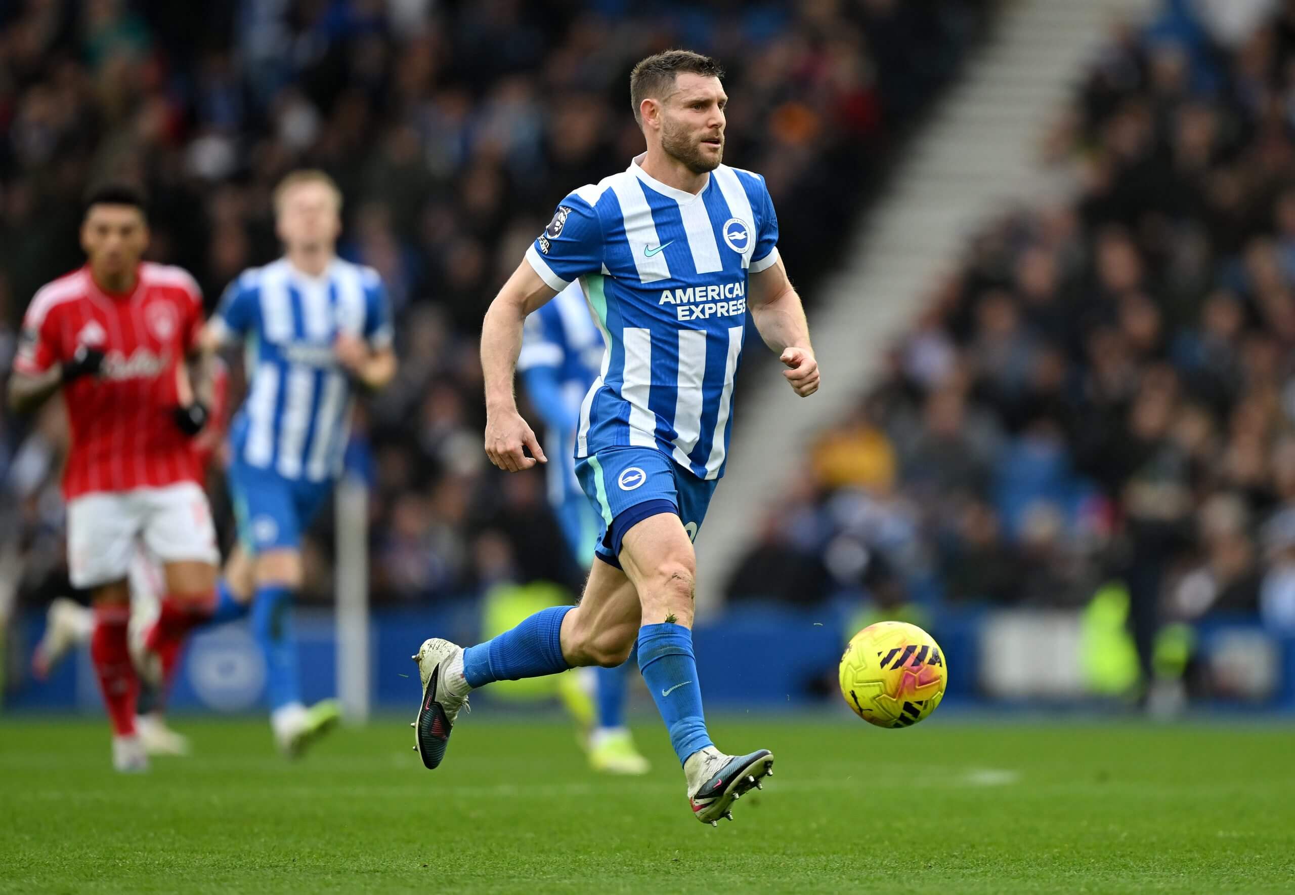 James Milner runs with the ball against Forest