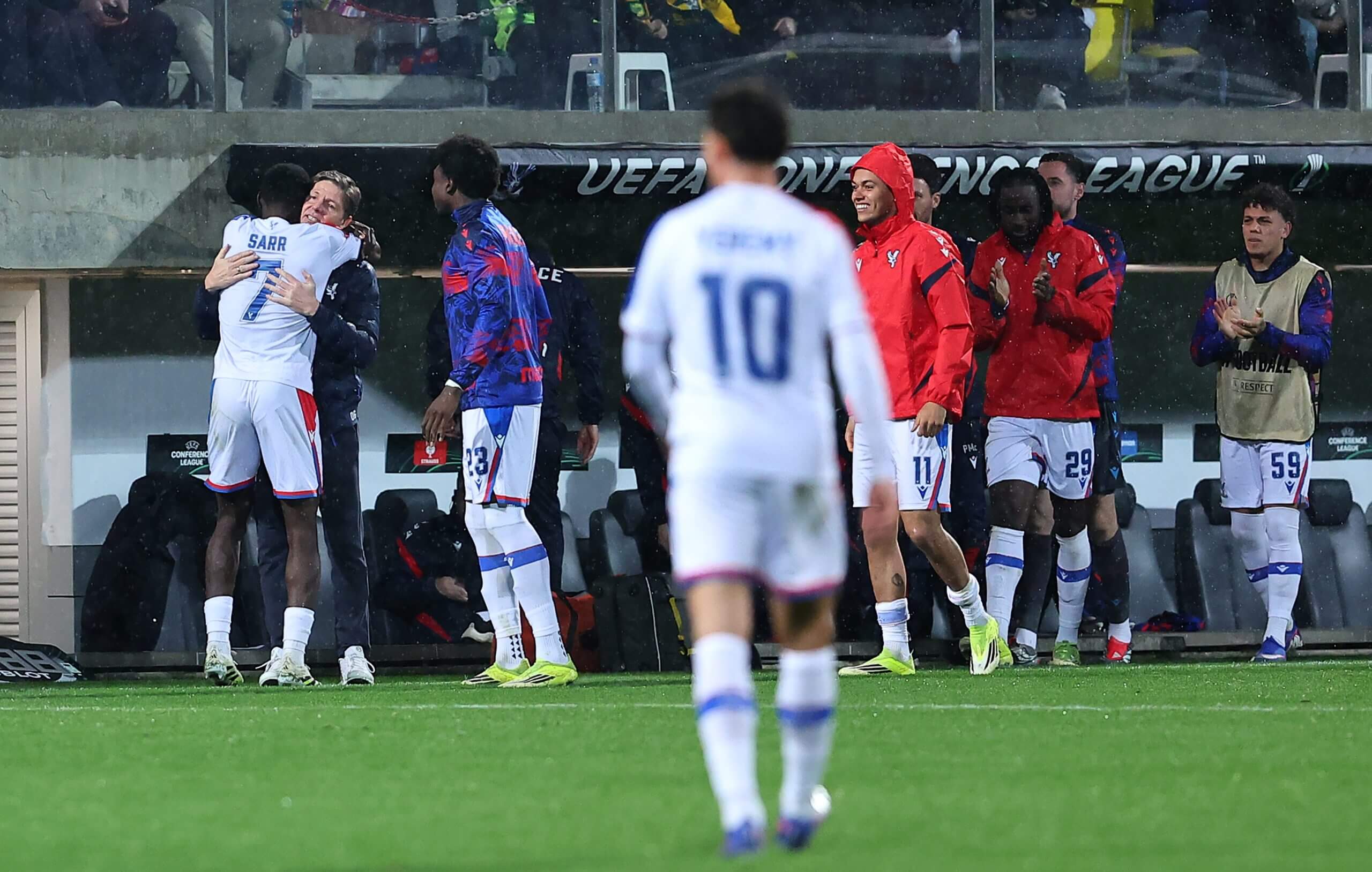 Ismaila Sarr hugs Oliver Glasner after scoring against AEK Larnaca
