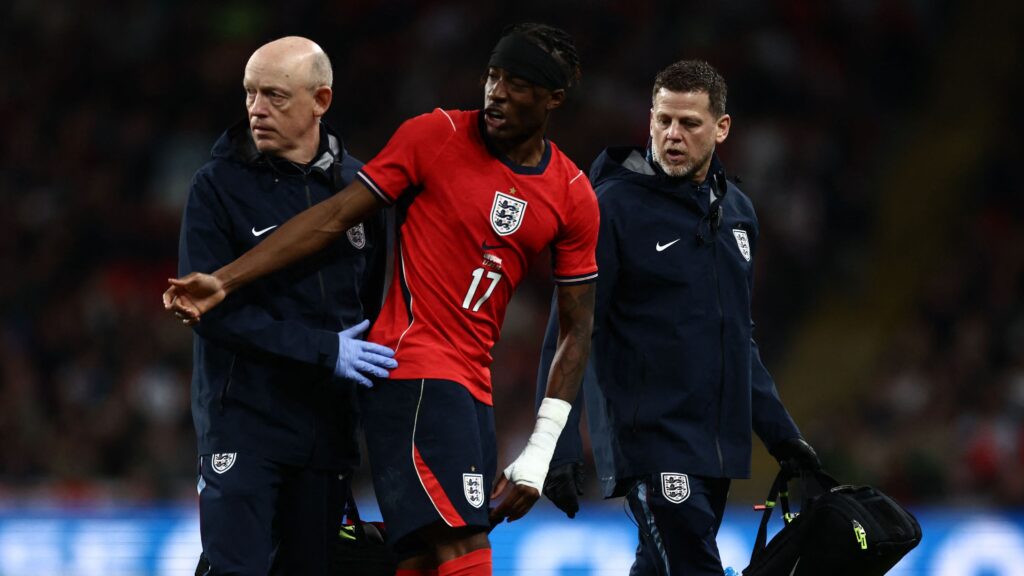 Arsenal sweat on Noni Madueke's fitness as England winger is forced off injured in friendly against Uruguay & leaves Wembley with leg in brace