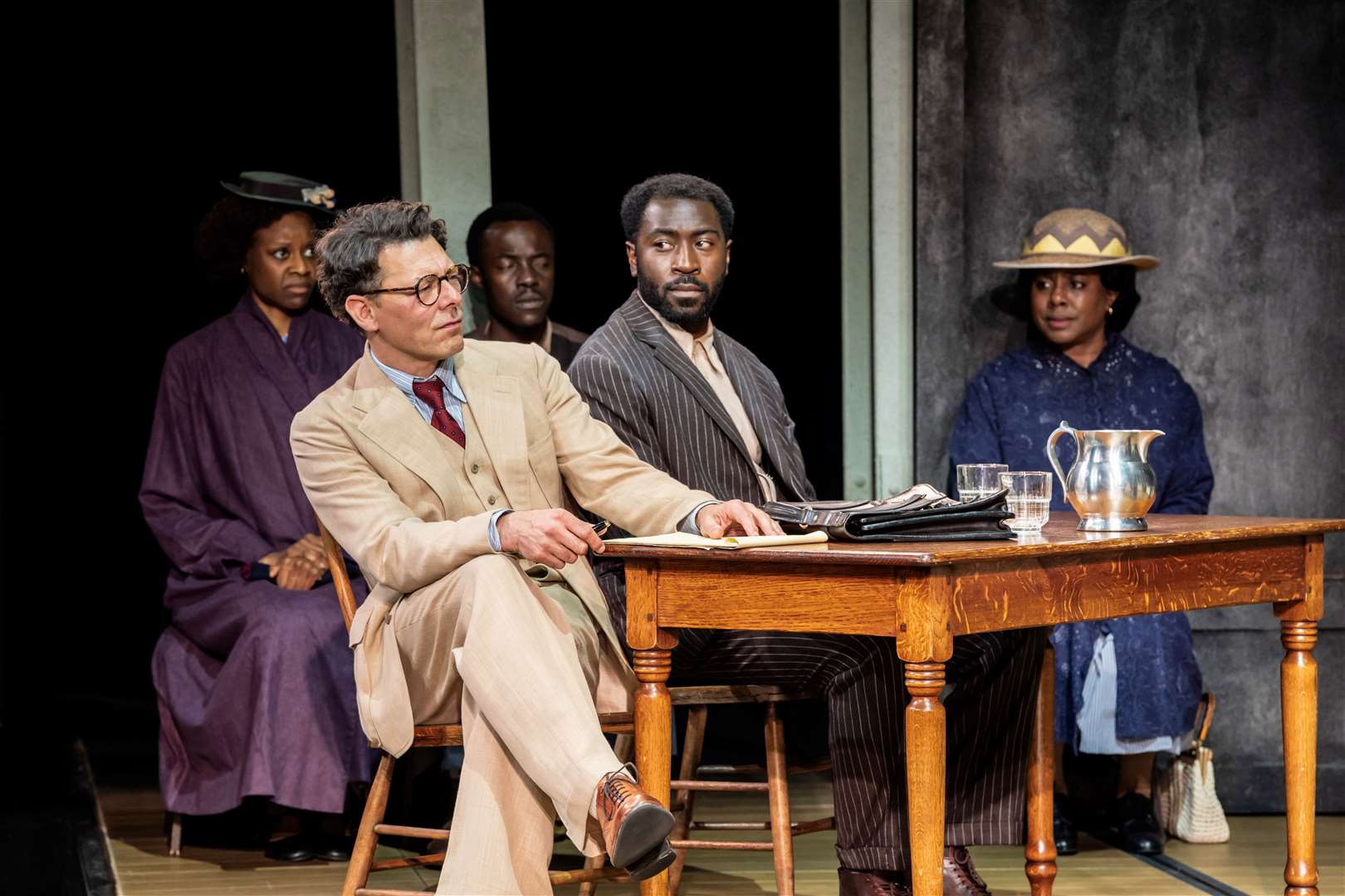 Richard Coyle as Atticus Finch and Aaron Shosanya as Tom Robinson with the To Kill A Mockingbird cast. Photo: Johan Persson.